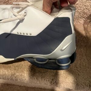 Stylish Nike Men's White and Blue Athletic Shoes high tops size 9. Awesome fit!